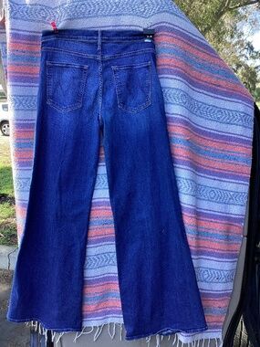 Mother denim. The Twister Sneak on the left size 31